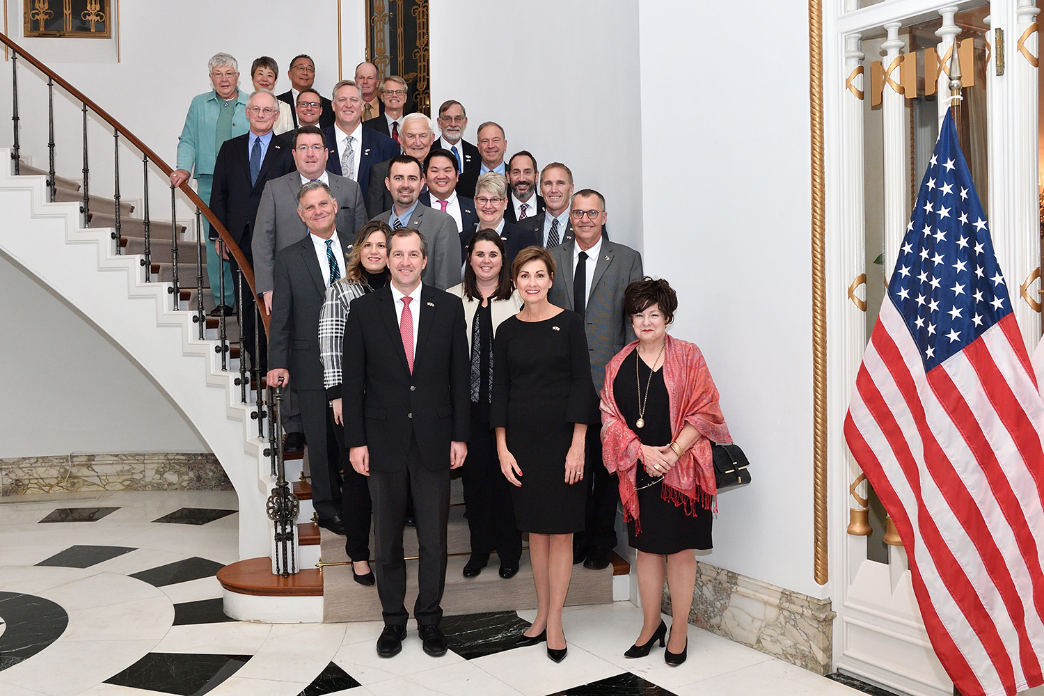 Iowa Gov. Reynolds, Iowa Secretary of Agriculture Mike Naig and Iowa Economic Development Authority Director Debi Durham with the Iowa delegation during the Embassy Reception. 